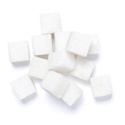 white sugar cubes isolated on white background, top view, flat lay.